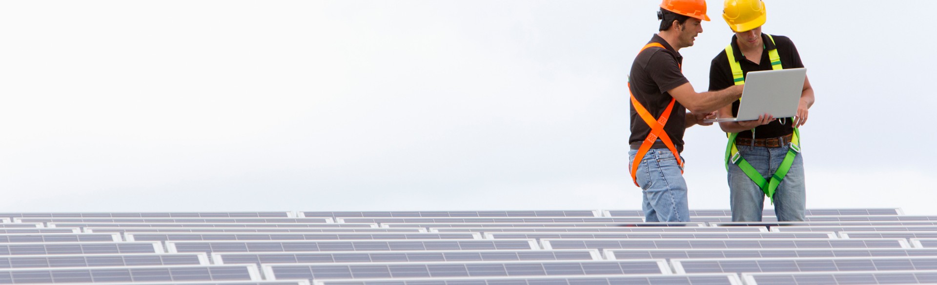 Image of two engineers at a photovoltaic farm supervising the installation while talking and looking into a laptop (ISO 160). All my images have been processed in 16 Bits and transfer down to 8 before uploading.